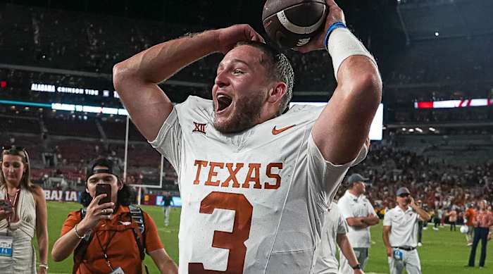 Texas Longhorns quarterback Quinn Ewers celebrates a 34-24 win over Alabama at Bryant-Denny Stadium
